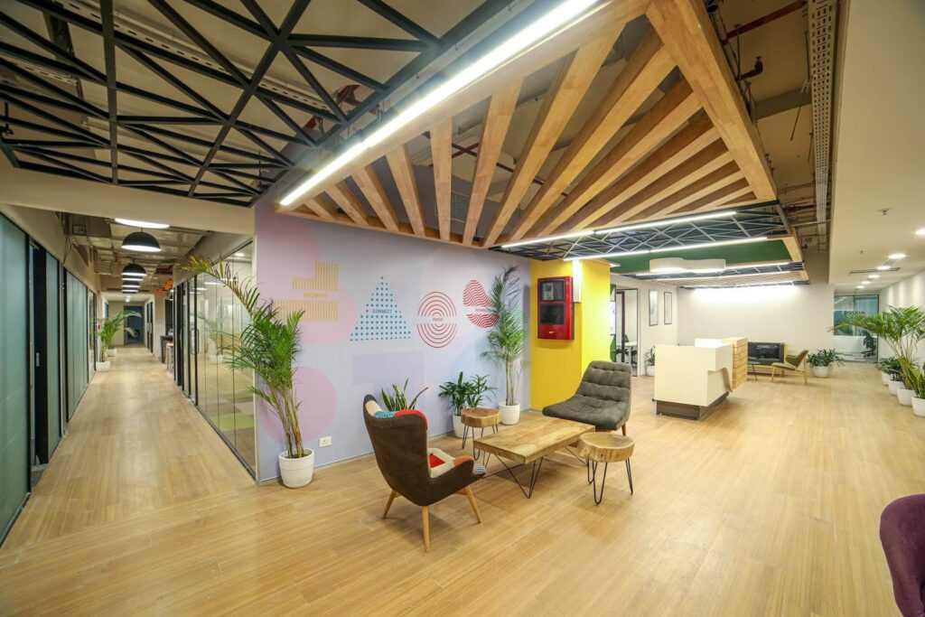 Wood and wooden materials are frequently used in modern office ceiling design projects